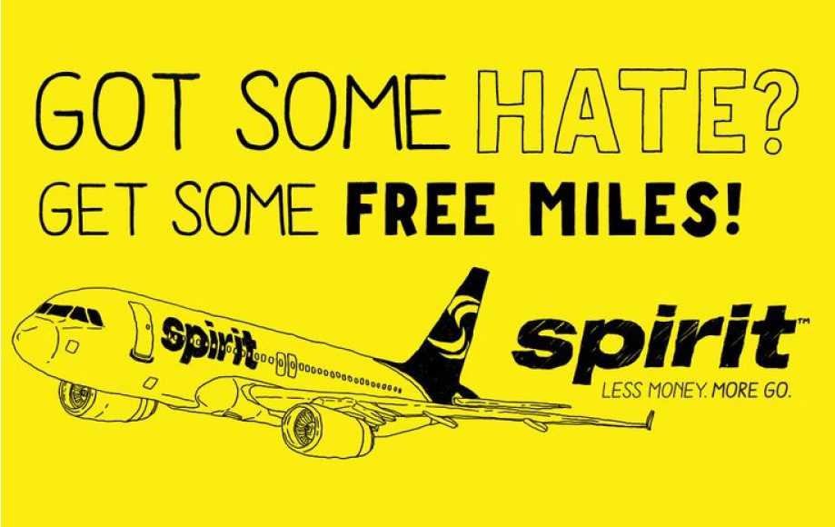 Illustrative image of a Spirit Airlines plan flying promoting free miles for sending hateful feedback